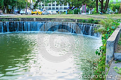 Chiang Mai, Thailand - January 11, 2023 : Overflow weir for waste water treatment Editorial Stock Photo
